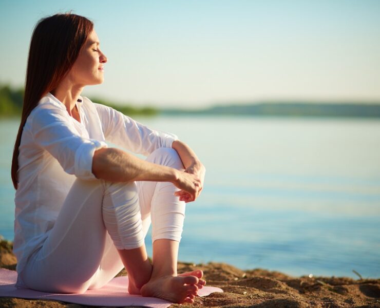 relaxed-woman-enjoying-sea_1098-1441